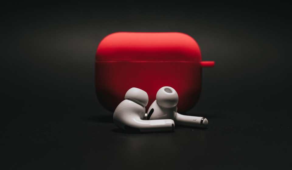 are airpods case covers worth it? image of a red case cover for Airpods on a black background